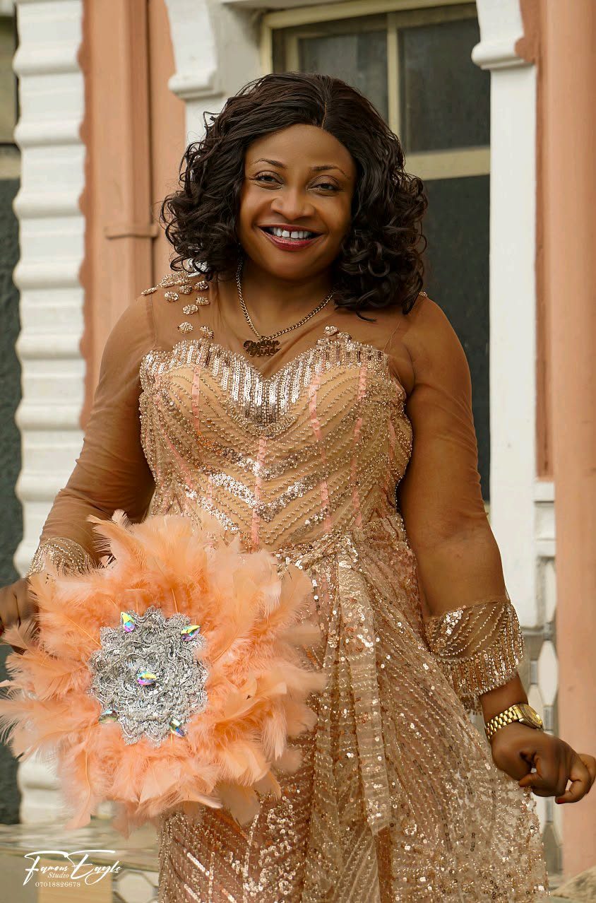 Nurse Vivian Okafor photographed in formal dress, the woman her community calls Ogochukwu